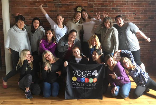 group photo of yoga in the classroom leaders